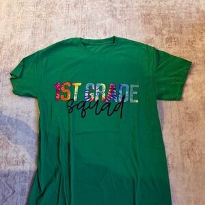 1st Grade Squad teacher Green Graphic Tee